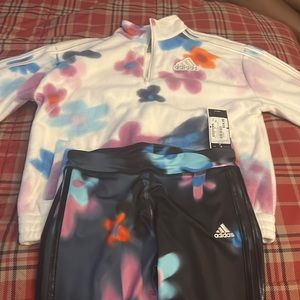 Brand new Addis’s tracksuit pants and a jacket to match